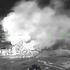 A drone footage shows fire and smoke rising from buildings, in what Ukrainian President Volodymyr Zelenskiy said was an attack on an oil depot in the city of Kerch