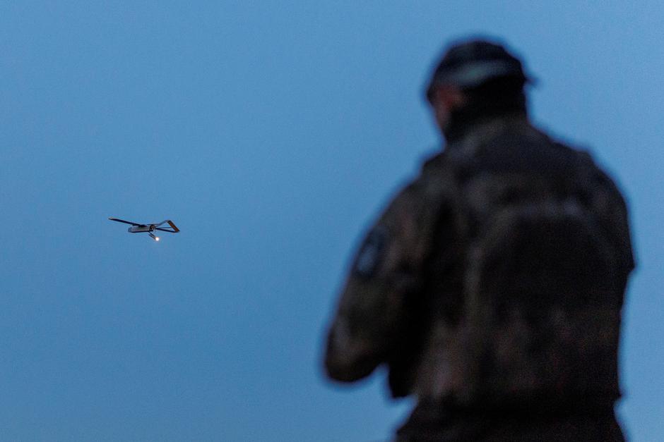 Ukrainian serviceman looks at an FP-1 deep-strike drone as it launches for a combat mission in an undisclosed location in Ukraine | Author: Valentyn Ogirenko