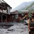 Pakistan Army soldier stands at the premises of the Bilal Mosque, after it was hit by an Indian strike in Muzaffarabad