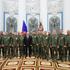 Russia's President Putin meets with service members in Moscow
