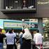 Person dressed up as US President Donald Trump performs inside mock prison cell in Tehran