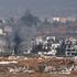 Smoke rises from Gaza after an explosion, as seen from the Israeli side of the border