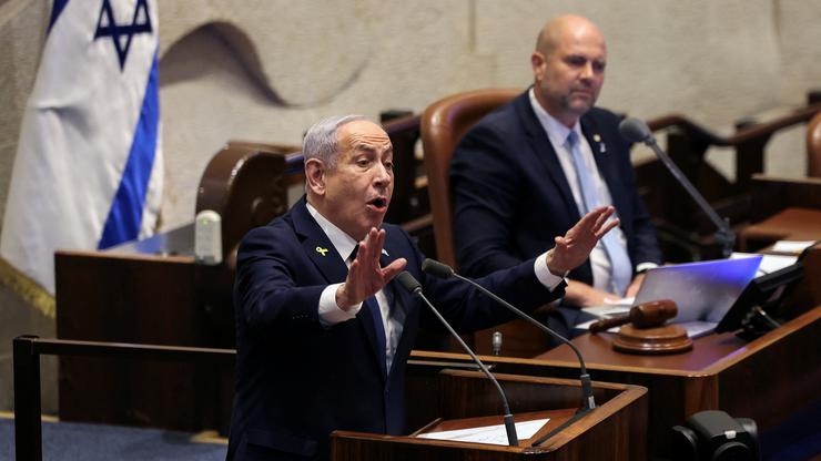 Israeli Prime Minister Netanyahu speaks at the plenum of the Knesset, in Jerusalem