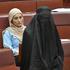 One Nation leader Hanson wears a burqa in the Senate chamber at Parliament House in Canberra