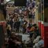 People take shelter inside a metro station during a Russian missile and drone attack, in Kyiv