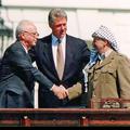 US PRESIDENT BILL CLINTON with Israeli Prime Minister Yitzhak Rabin at left and PLO Chairman Yasser  Arafat at the signing of the Oslo Accords on 13 September 1993