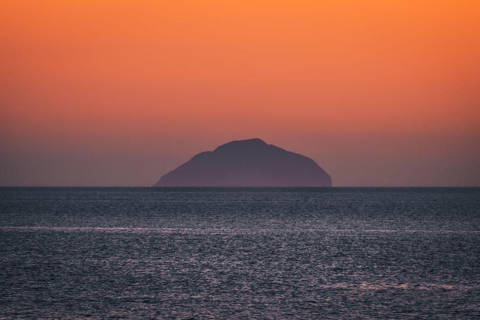 UK: WEATHER Troon , Ayrshire, Scotland 01st March 2022, the warm sun sets over ailsa craig and the goat fell tonight as we get closer to welcoming spring | Author: Profimedia