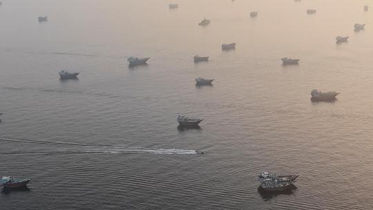 A drone view shows vessels in the Strait of Hormuz, as seen from Musandam