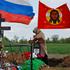 People visit a cemetery in Donetsk