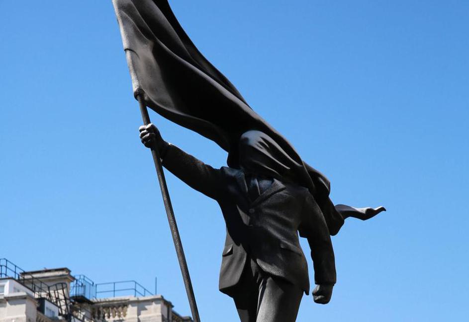 London, UK. 30 April 2026. A new artwork by Banksy appears in Waterloo Place, St James’s, central London, after the artist confirmed the piece on his Instagram account. The sculpture depicts a suited man blinded by a large flag covering his face while ste