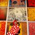 FILE PHOTO: Artist Yayoi Kusama poses for a photograph with her artwork "Love arrives at the Earth Carrying with it a Tale of the Cosmos" at the Tate Modern gallery in London