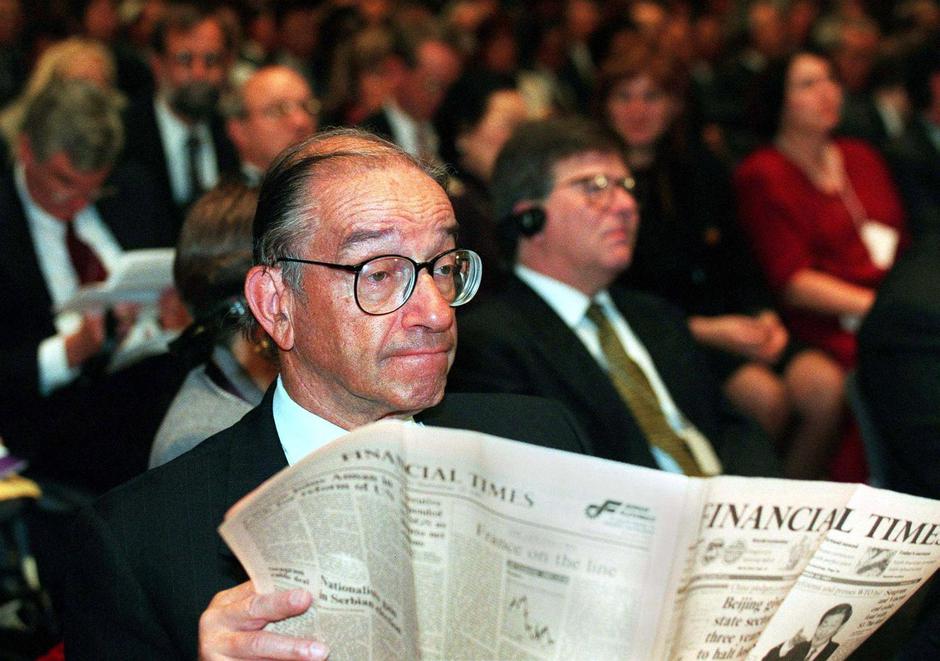 FILE PHOTO: ALAN GREENSPAN READS NEWSPAPER IN HONG KONG | Author: POOL Old/REUTERS
