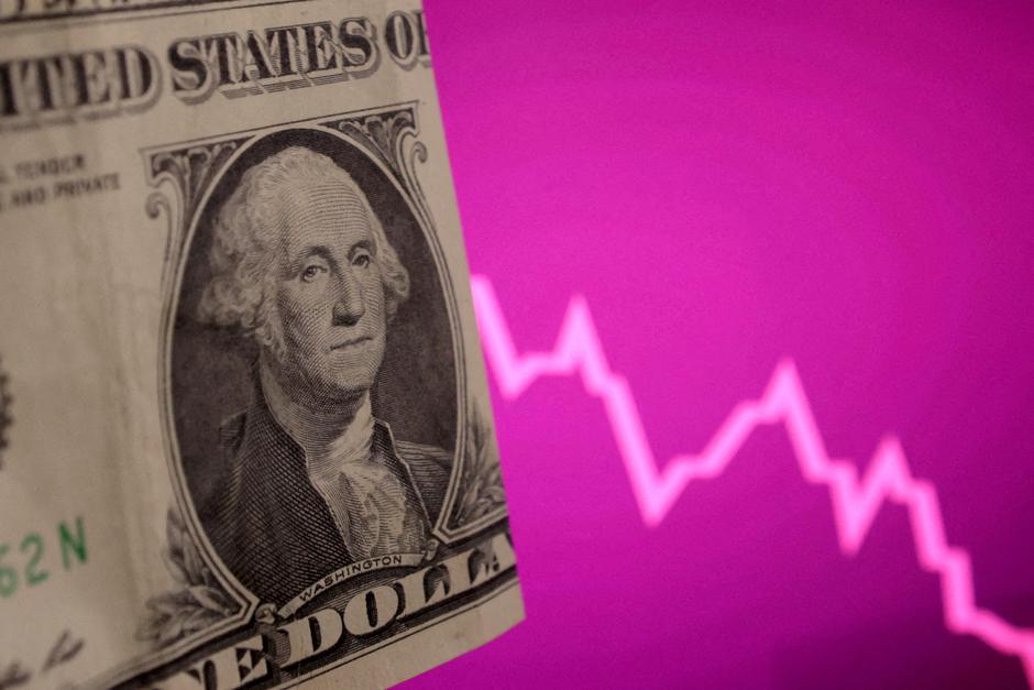 FILE PHOTO: FILE PHOTO: Illustration shows U.S. dollar banknote and decreasing stock graph | Author: Dado Ruvic