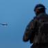 Ukrainian serviceman looks at an FP-1 deep-strike drone as it launches for a combat mission in an undisclosed location in Ukraine