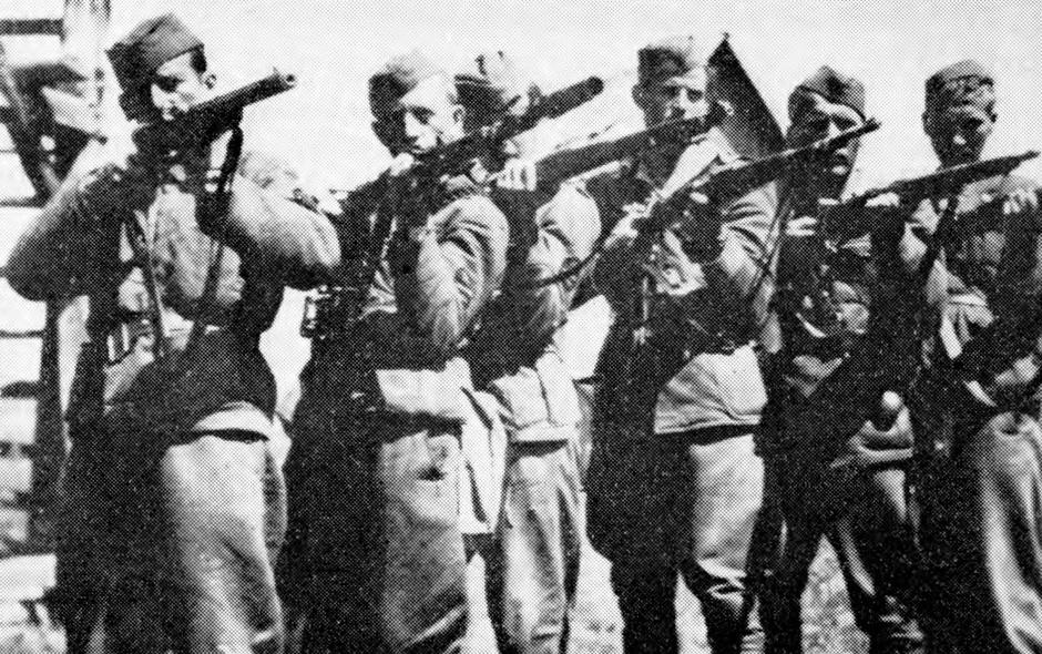 A historical photograph of the staff of the 2nd Battalion of the Gradnik Brigade, a Slovene partisan unit, showing leadership members in a wartime context. | Author: Profimedia