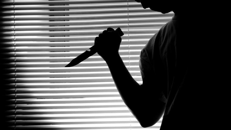 Ilustracija ubojice s nožem u ruci