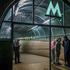 People take shelter inside a metro station during a Russian missile and drone attack, in Kyiv