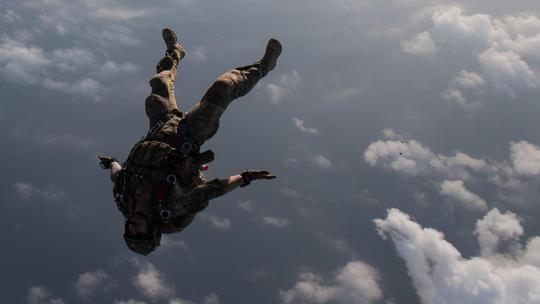 82nd Expeditionary Rescue Squadron is a U.S. Air Force unit performing a military free fall jump in Djibouti, Africa on April 17, 2018. The archival image records airborne operations and training for humanitarian and contingency missions under CJTF-HOA. T