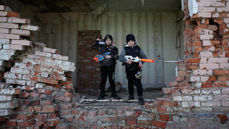 The Wider Image: Childhood shaped by war for two Ukrainian brothers