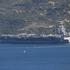 US Navy aircraft carrier ship docks at Crete