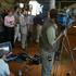 FILE PHOTO: Veteran CNN correspondent Christiane Amanpour makes a live broadcast while surrounded by reporters taking notes in Baghdad