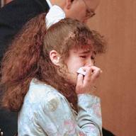 Christa Pike is escorted from Knox County Criminal Court in Knoxville, Tennessee
