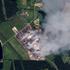 A satellite view shows smoke rising from a Wildberries facility, in Elektrostal