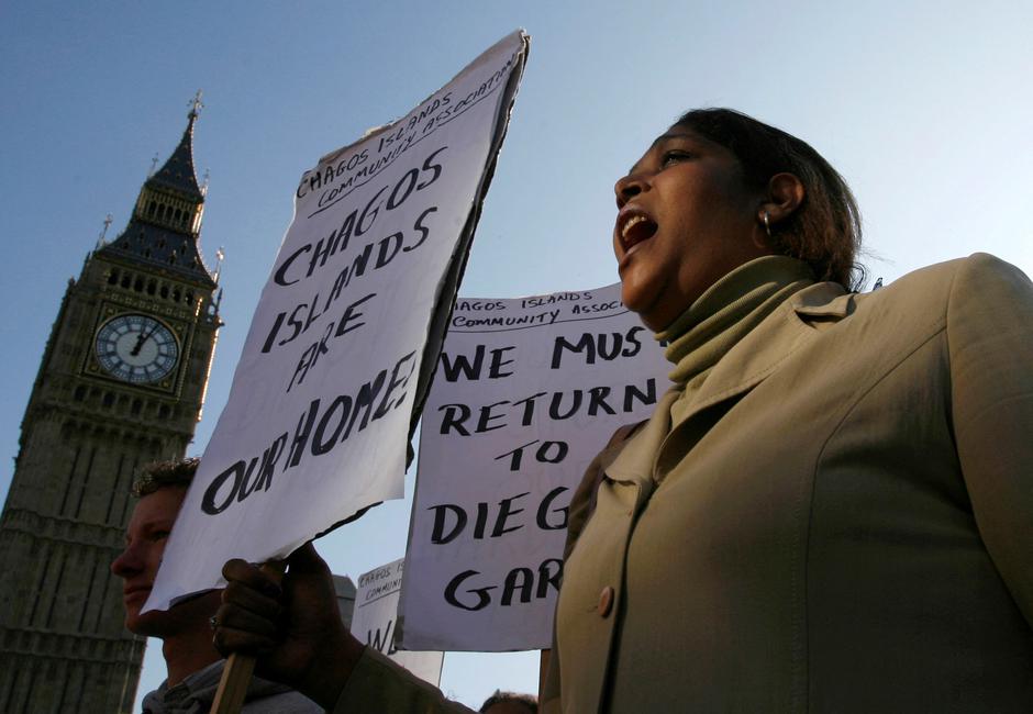 FILE PHOTO: Demonstrator demanding her return to the Chagos Islands in the Diego Garcia archipelago shouts during a protest outside the Houses of Parliament in London | Author: Andrew Winning