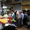 People walk at Tajrish Bazaar in Tehran
