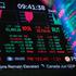 A screen displays stock market information after the opening bell at the New York Stock Exchange (NYSE) in New York City