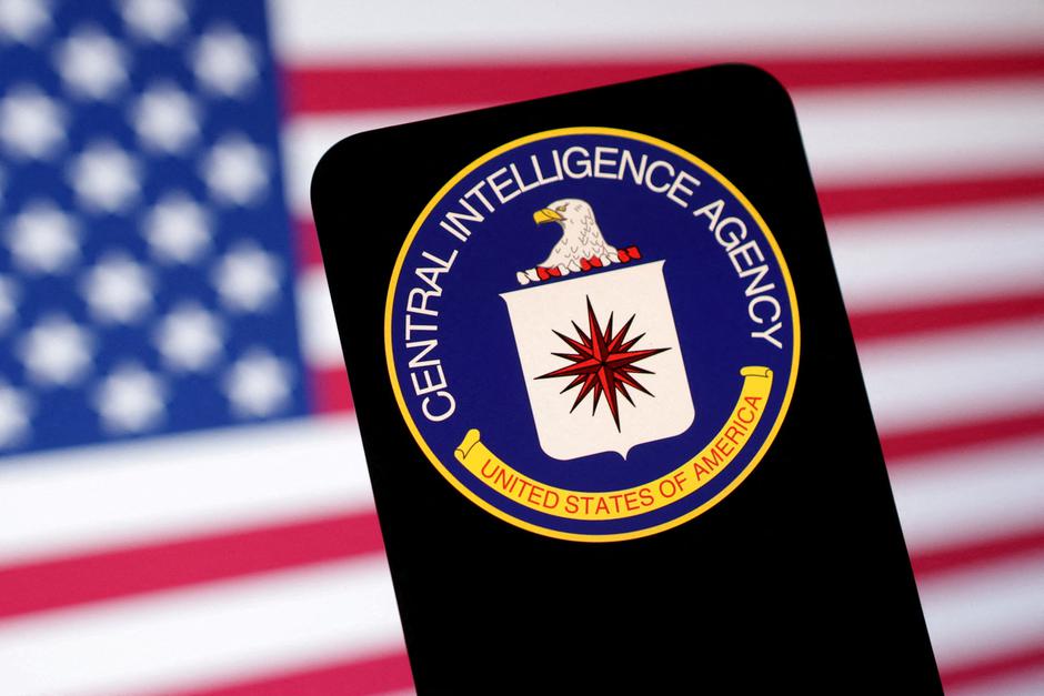 FILE PHOTO: Illustration shows CIA (Central Intelligence Agency) logo and U.S. flag | Author: DADO RUVIC/REUTERS