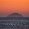 UK: WEATHER Troon , Ayrshire, Scotland 01st March 2022, the warm sun sets over ailsa craig and the goat fell tonight as we get closer to welcoming spring