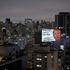 An image of US President Donald Trump and the phrase “Brazil is not a backyard, election without Trump” (Brasil nao e quintal, eleicao e sem Trump) are projected on a building