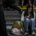 People take shelter during a Russian missile and drone strike, amid Russia's attack on Ukraine, in Kyiv