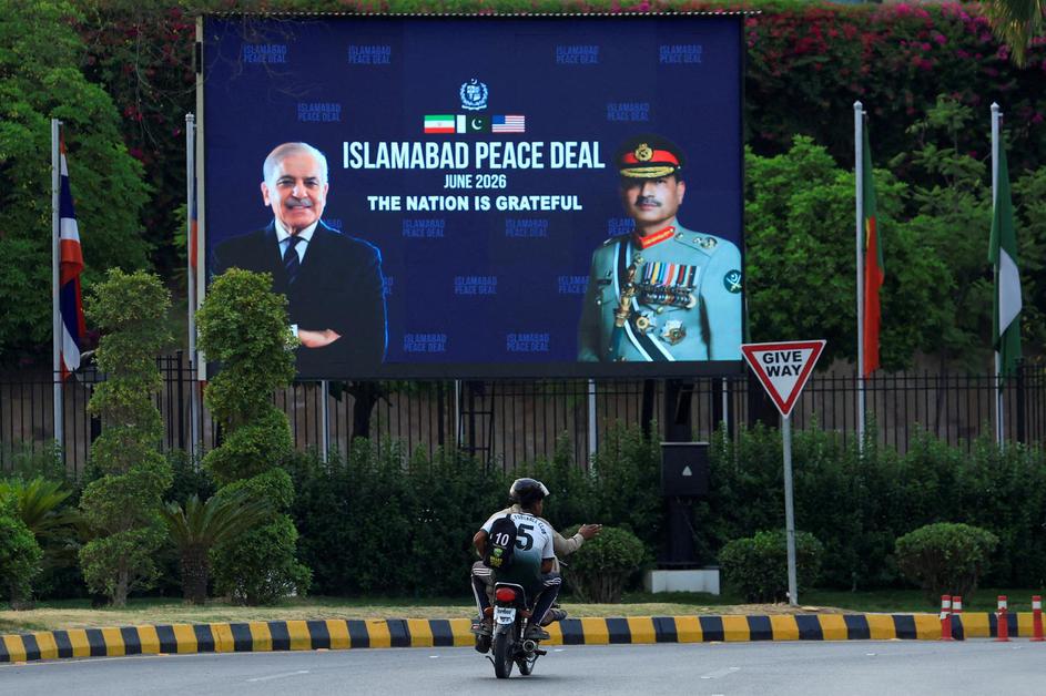 Billboard displaying portraits of Pakistan's Chief of Army Staff Field Marshal Asim Munir and Prime Minister Shehbaz Sharif, following a deal between the U.S. and Iran, in Islamabad