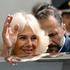 Queen Camilla waves following a visit to the Istituto Comprensivo Alessandro Manzoni, a local state school in Rome, to meet children who have been taking part in a competition to mark the 80th anniversary of the British Council imagining a day in the life