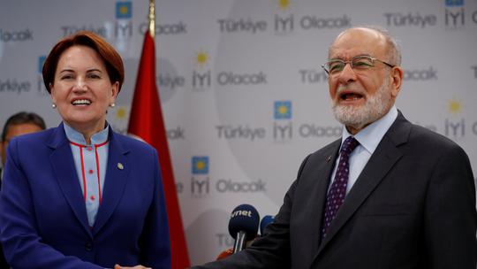 Temel Karamollaoglu i Meral Aksener