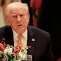 U.S. President Trump takes part in a Christmas Eve dinner in the ballroom of his Mar-a-Lago club in Palm Beach