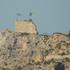 An Israeli flag and a flag of the Golani Brigade are raised on Beaufort Castle, as seen from Marjayoun