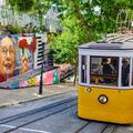 Gloria Funicular hill yellow tram, street art, city of Lisbon, Portugal
