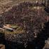 Mourners gather on the day of the burial of Iran's late Supreme Leader Ayatollah Ali Khamenei, who was killed on February 28 in Israeli and U.S. airstrikes, in Mashhad