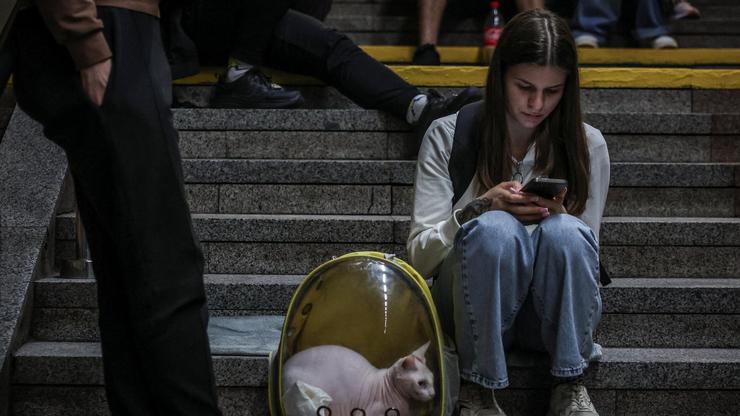 People take shelter during a Russian missile and drone strike, amid Russia's attack on Ukraine, in Kyiv