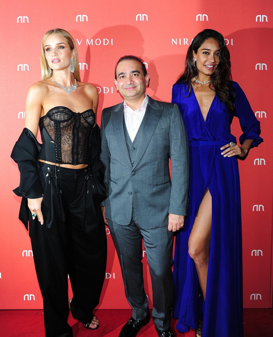 MODEL ROSIE HUNTINGTON WHITELEY STUNNED IN A CLASSIC OUTFIT AT THE MODI JEWELLERY LAUNCH ON OLD BOND STREET . | Author: 