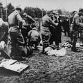 Ustase guards stealing the possessions of newly arrived prisoners in the Jasenovac concentration camp. Jasenovac was a camp system  in Croatia that included forced labour camps as well as the specific killing site at Donja Gradina). An estimated 500,000 p
