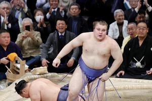 Ukrainian sumo wrestler sekiwake Aonishiki, his real name Danylo Yavhusishyn, beats yokozuna Hoshoryu to win the Emperor's Cup sumo tournament in Fukuoka