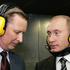 FILE PHOTO: Russian President Putin and Defence Minister Ivanov talk at a shooting gallery in Moscow