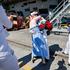 The US Navy Nimitz-class aircraft carrier USS Abraham Lincoln returns home following an extended deployment in the Middle East at Naval Base Coronado in San Diego