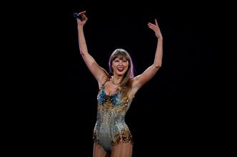 FILE PHOTO: Taylor Swift performs as her record-breaking The Eras Tour comes to an end in Vancouver