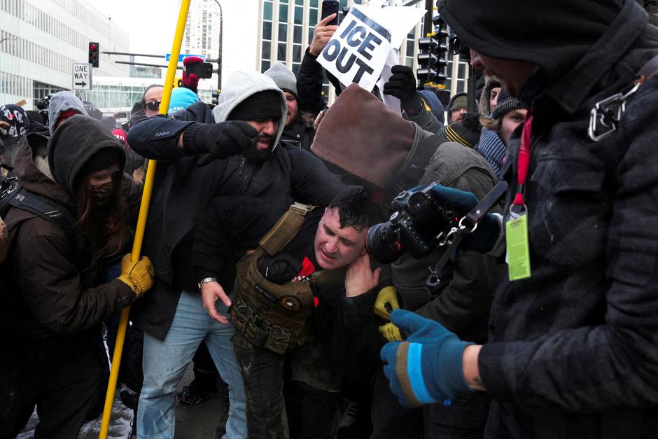 FILE PHOTO: People attend the "March Against Minnesota Fraud" in Minneapolis | Author: Leah Millis