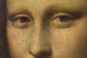 This famous detail of the *Mona Lisa*, painted by Leonardo da Vinci, highlights the enigmatic eyes of the subject. The portrait, housed in the Louvre, is renowned for its intricate rendering and the mysterious expression of the sitter, which has intrigued